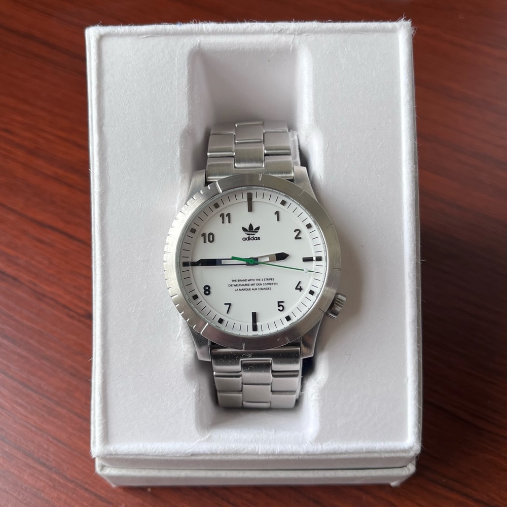 Adidas Nixon Men’s Watch White Face Silver Band Made by Nixon